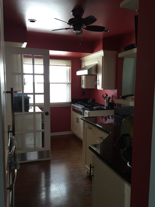 Kitchen on main level includes sub-zero freezer, Wolfe gas stove, dishwasher, and plenty of counter space.