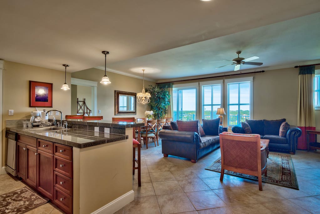 Kitchen area overlooking living and dining area
