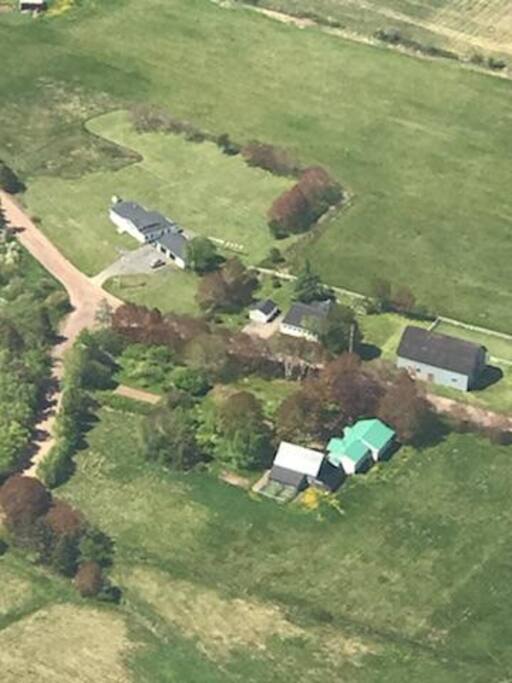 It's the green roofed house. Tidal beach 400 m towards upper left