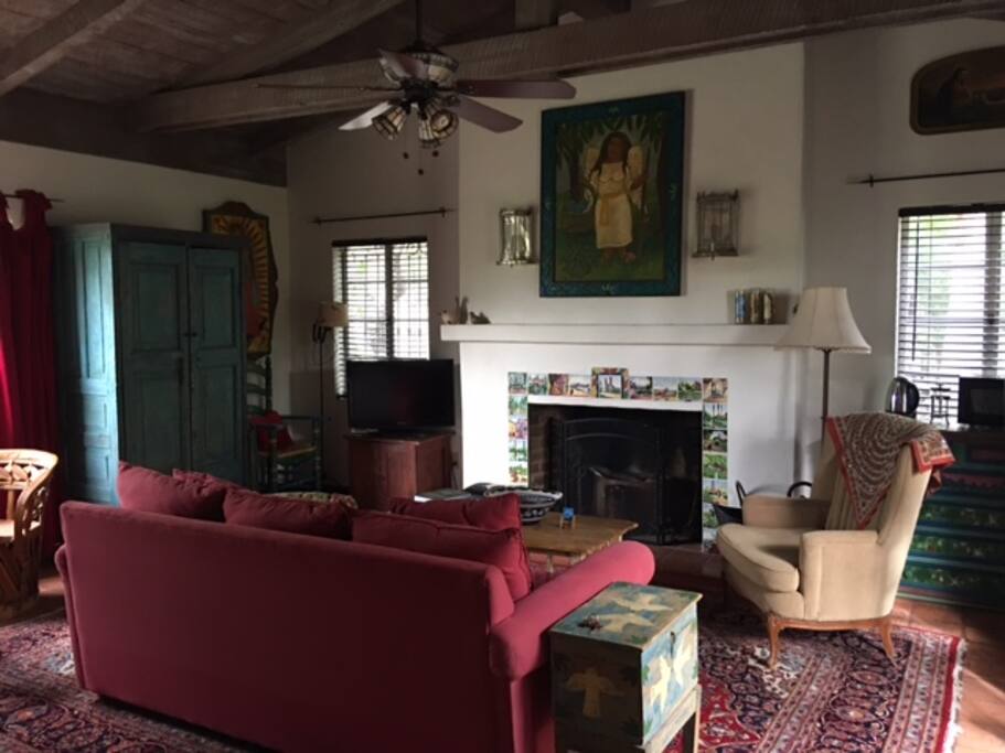 Cozy fireplace, comfy furniture.