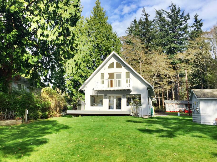 Cute two story house with large yard and two decks.