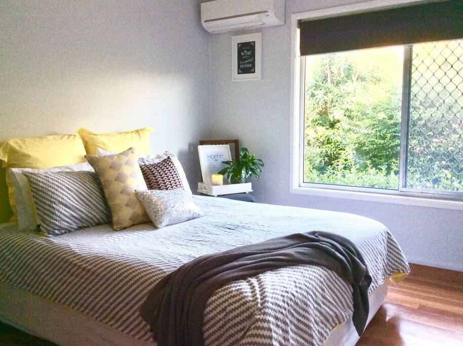 Retreat to your private room with queen sized bed, garden view, air conditioning and wardrobe.