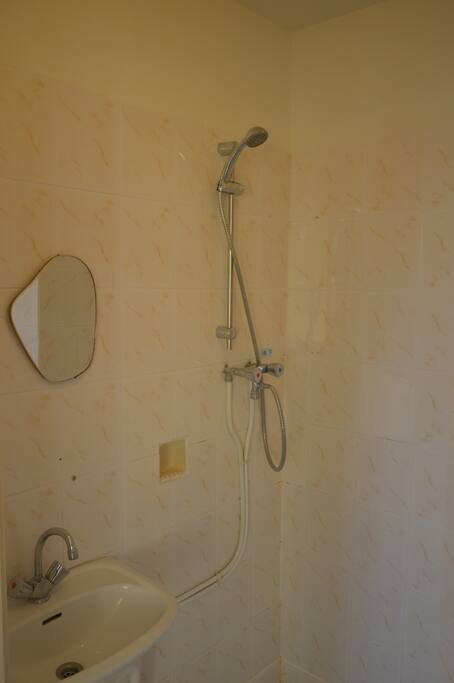 Shower on upper floor is basic but clean. The house has 2 toilets and one shower.