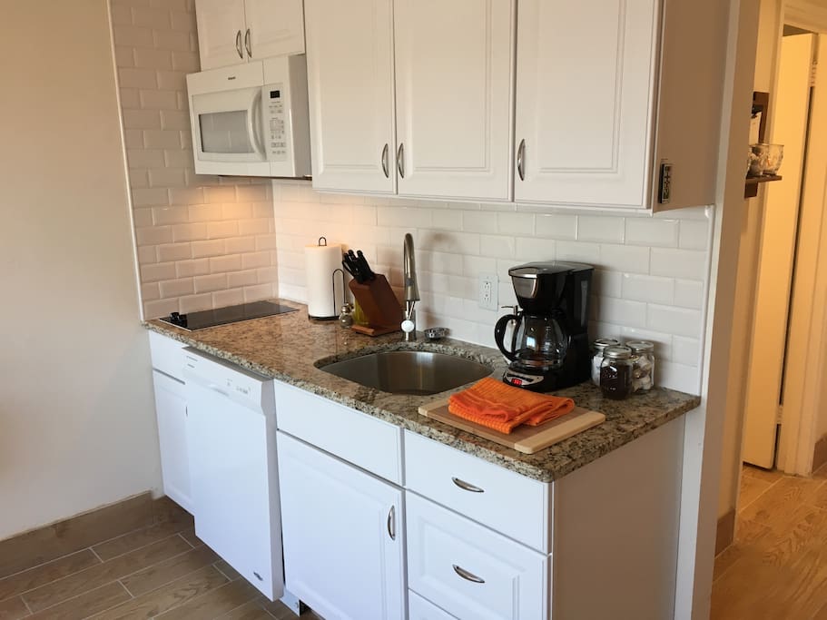 The kitchenette has everything you could need. Cooktop, microwave, sink with disposal, coffee maker, refrigerator, freezer and toaster oven are available.