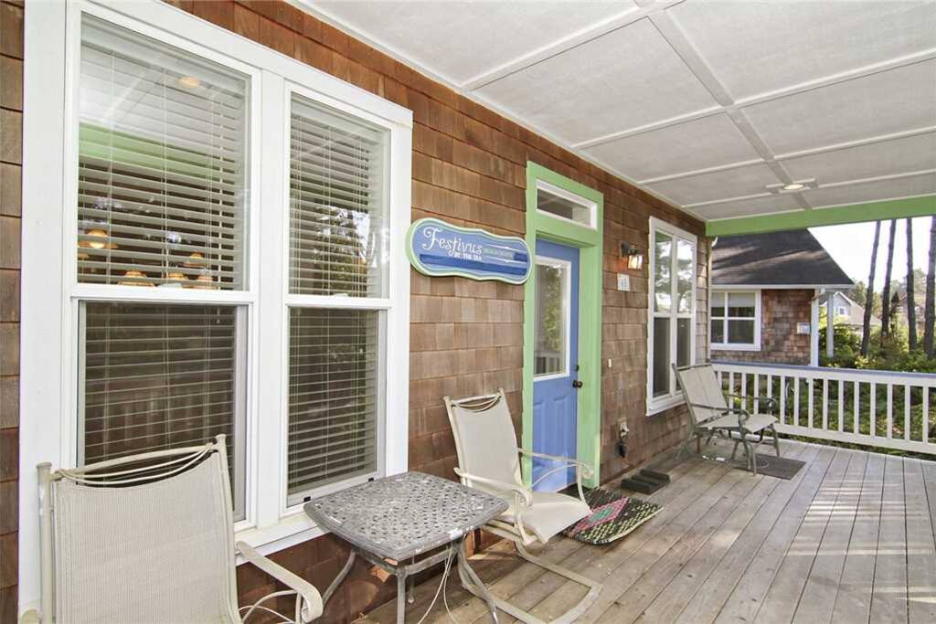 Front porch of Festivus with a view of the community