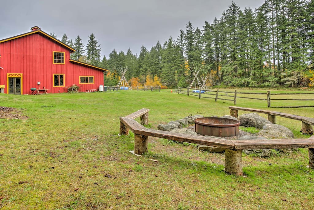 The cabin sits on 10 acres and includes a campground, rec barn, fire pit, and more!