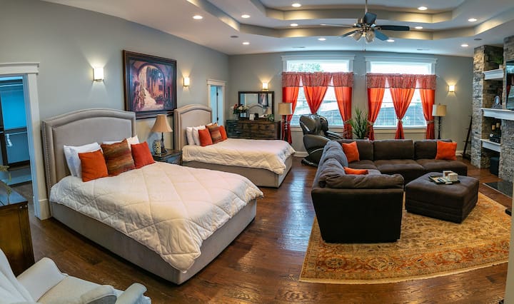 Impressive Primary Suite with wet bar, refrigerator & fireplace; wonderful massage chair