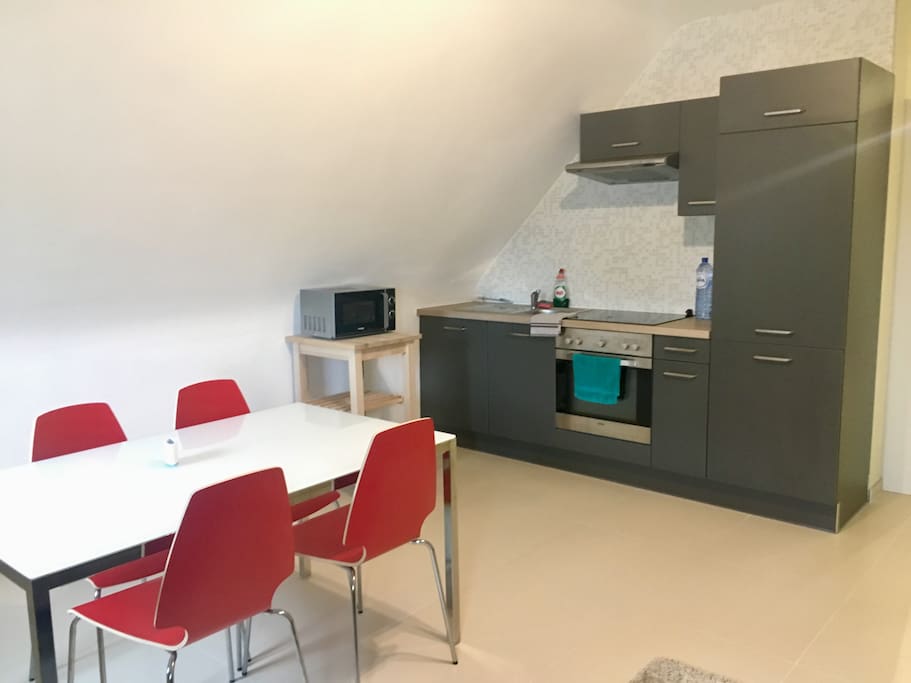 Full equipped kitchen with oven, 4 hobs, microwave, fridge, freezer, pans and all the kitchen ustensils.