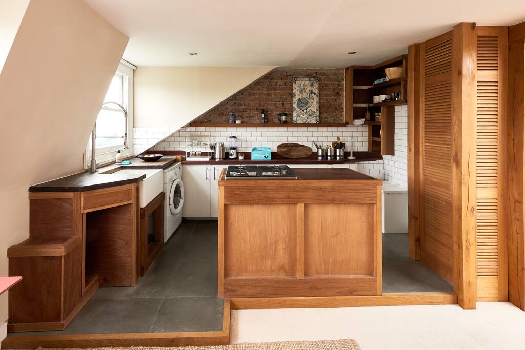 Prepare a meal on the lovely wooden island!
