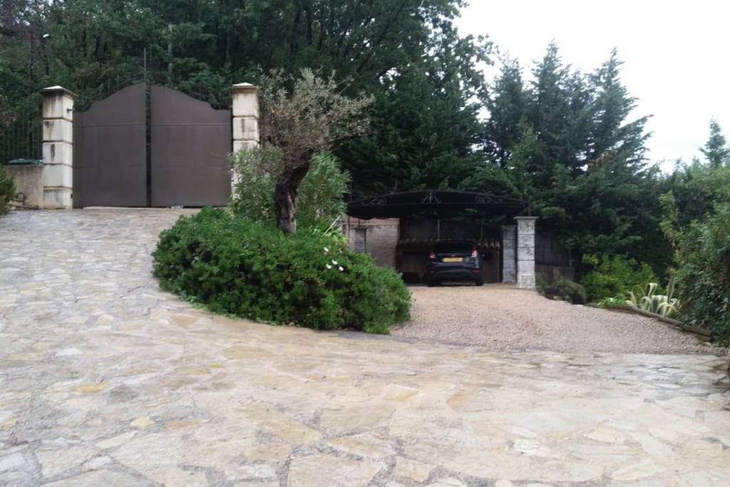 A sweeping driveway takes you to the property