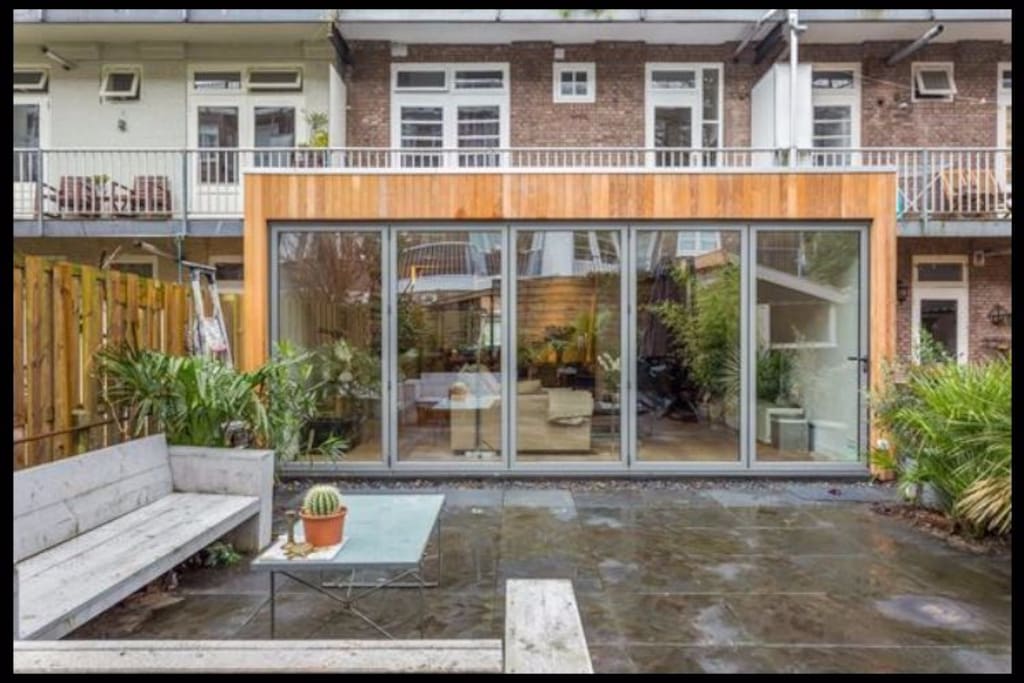Large garden / terrace with 2 chairs, 2 tables and 1 bench, great for BBQ!