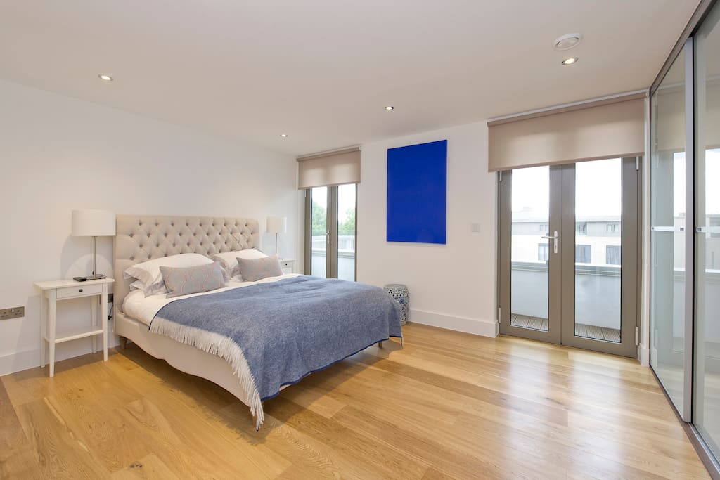 Bedroom 1: Master Bedroom leading directly onto balcony. There is also an en-suite shower room with toilet plus lots of hanging space for your purchases in the closet. There is also a wall hung flatscreen TV in the master bedroom.