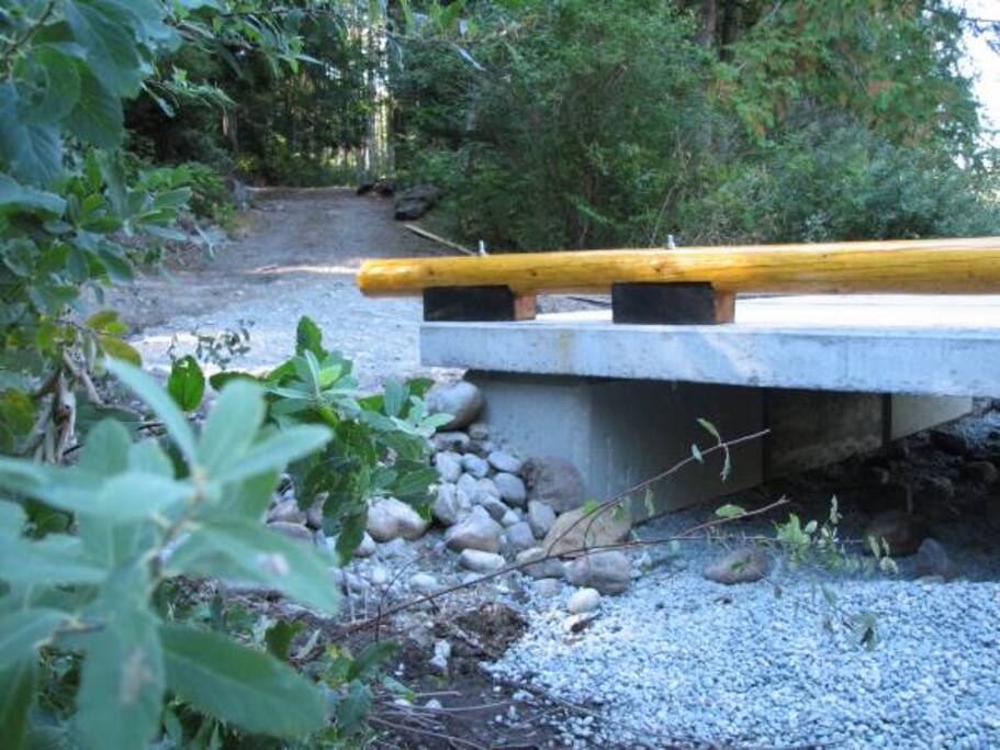 Bridge over Creek and road to house