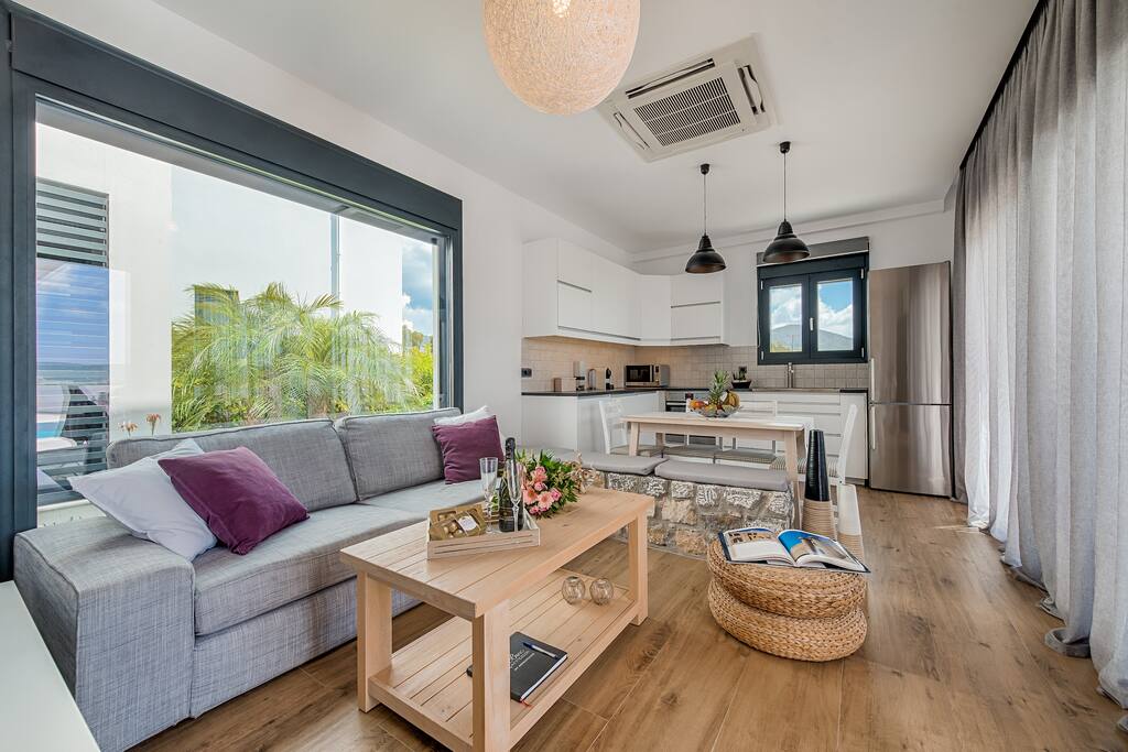 Comfortable living room and fully equipped kitchen