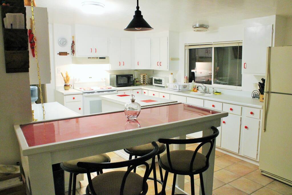 Kitchen fully equipped w/dishes, microwave, blender, toasters, pots and pans, etc.