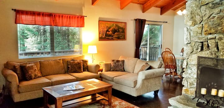 Upstairs Livingroom.  Furnished for Comfort. High Beamed Celing Mountain Home.