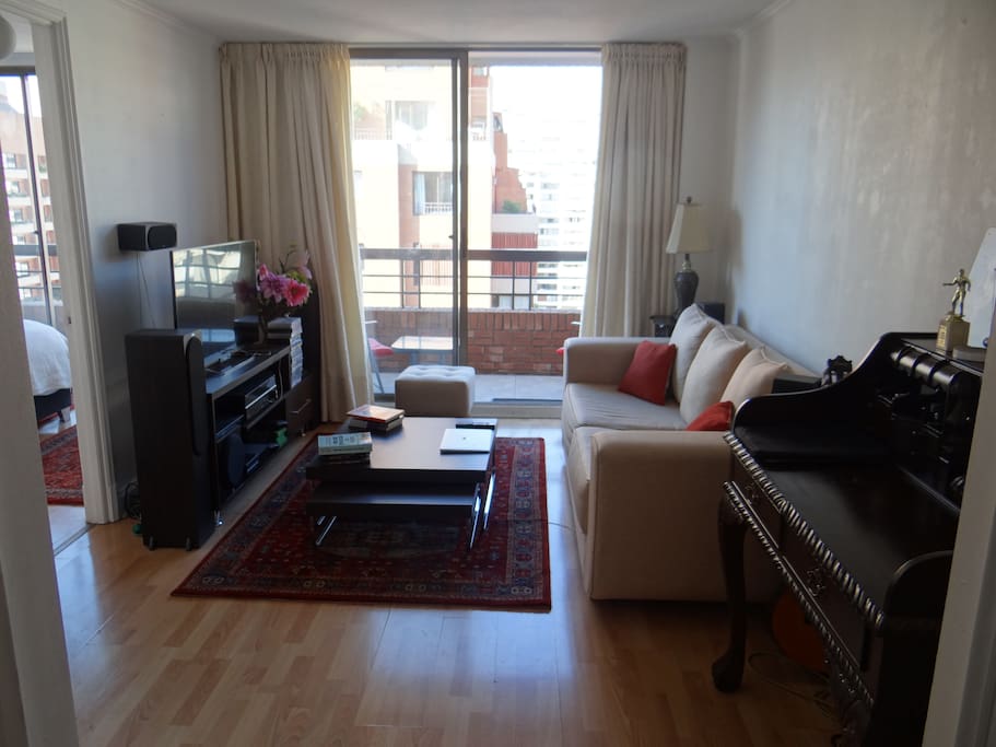 Living Room with TV and Home Theater & Balcony