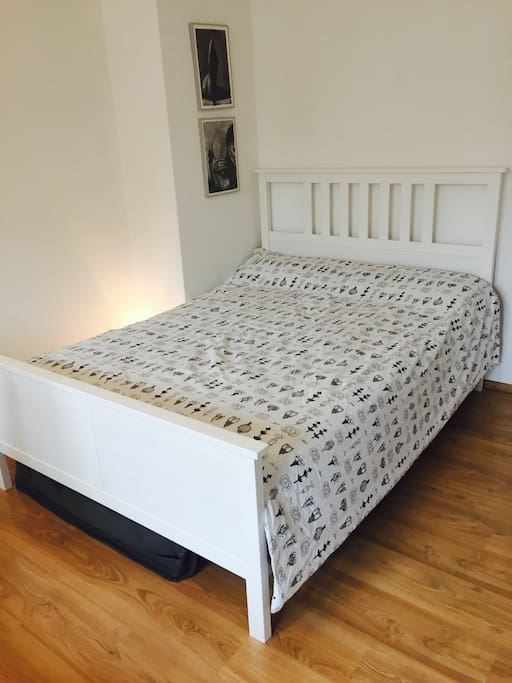Main bed. The guest mattress can be seen underneath, in its protective casing.