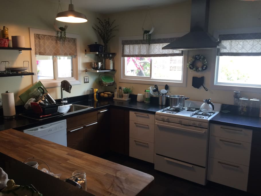 Full kitchen with breakfast bar and all the utensils you need to cook up something great!