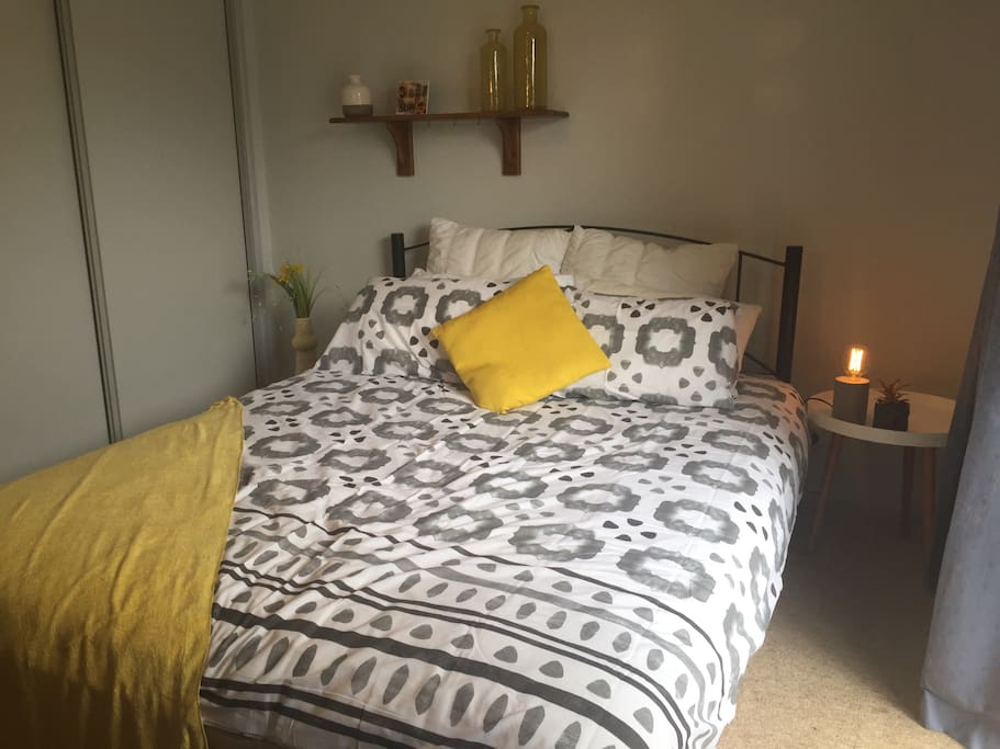 Queen size bed with towels and linens included.