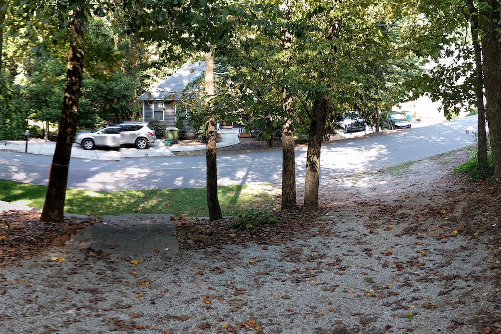 Front yard has a pull through driveway - your parking area. Fits 4 cars, easily. End to end.