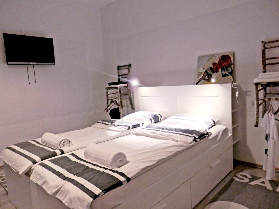 bedroom 1 with king size bed(2.00x1.60) and flat screen cable tv