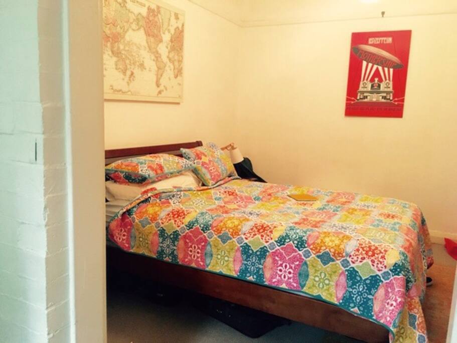 The main bedroom with sunroom dressing area