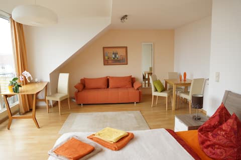 Erfolgreiche Airbnb-Immobilie: Sunny on the top floor + terrace, underground parking in Zentrum Süd