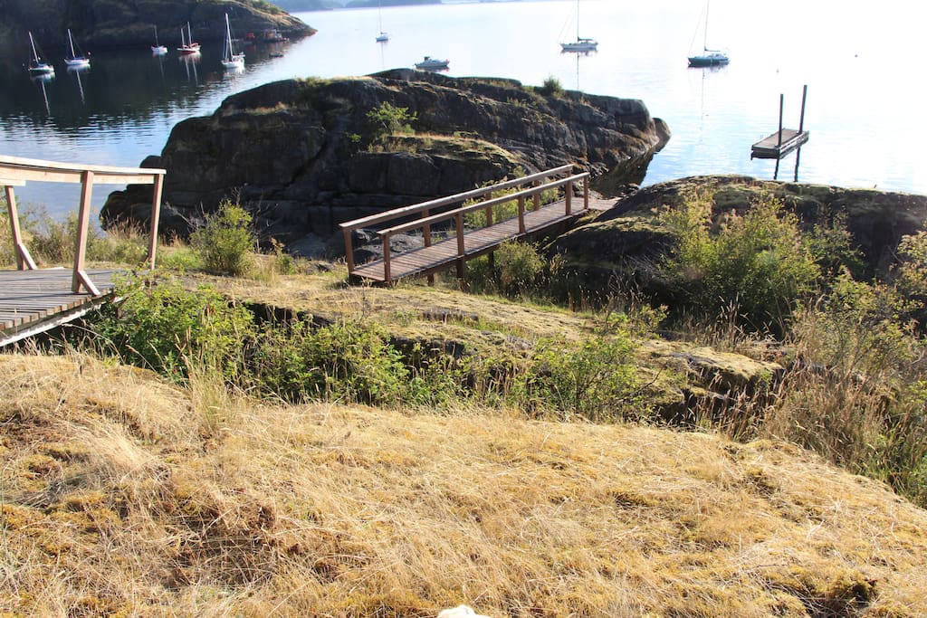Hike down to the waterfront, dock, and your own Mink Island!