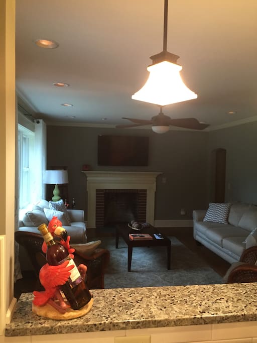 Fireplace and Flatscreen TV's in the Living Room with plenty of space for seating!
