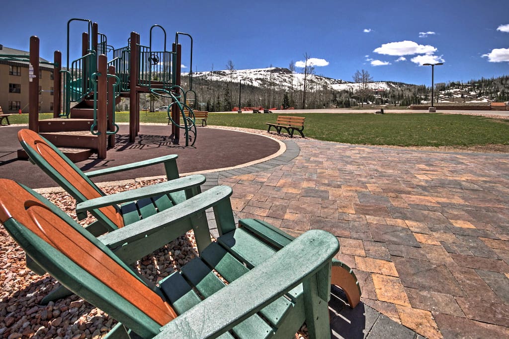Run around on the playground or relax in the lawn chairs and admire the splendid mountain views.