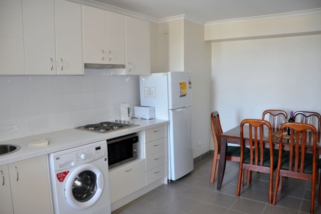 Fully equipped kitchen with dining 6 seater