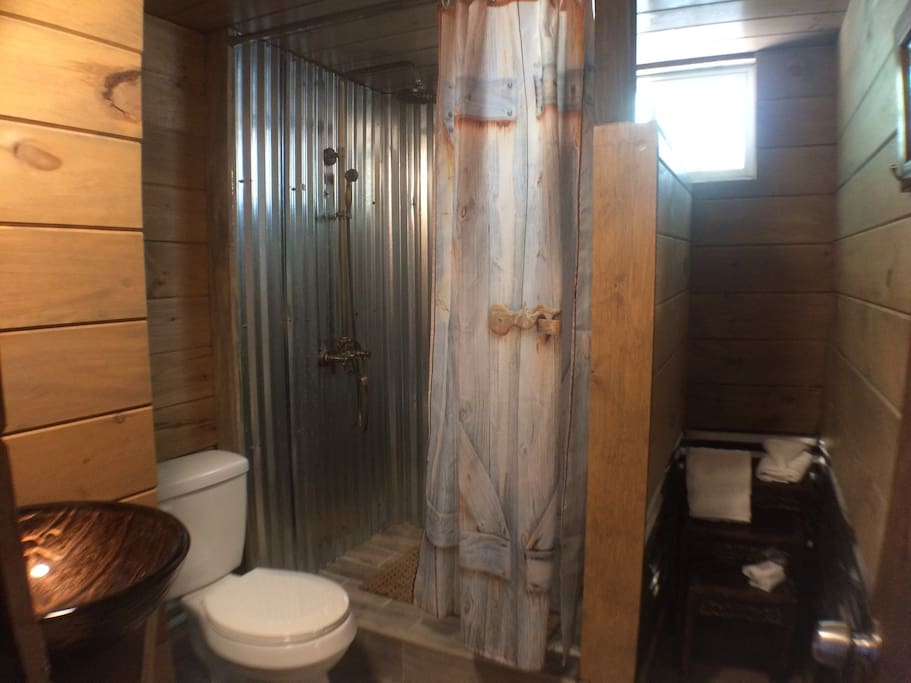 The large shower is part of the remodeled bathroom