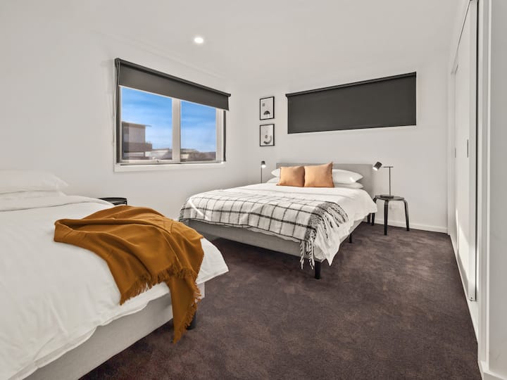 Second bedroom consists of 1 x Queen 1 x Single with built in wardrobe.