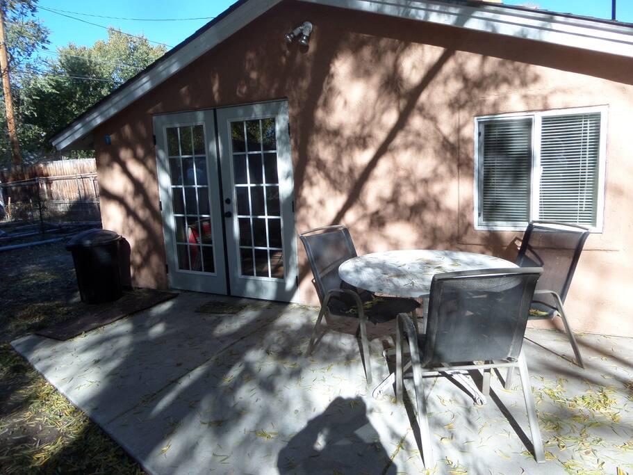 Studio entrance inside privacy fence in back yard.