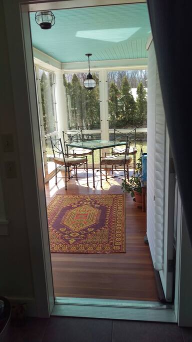 Glass or screened porch, depending on the season