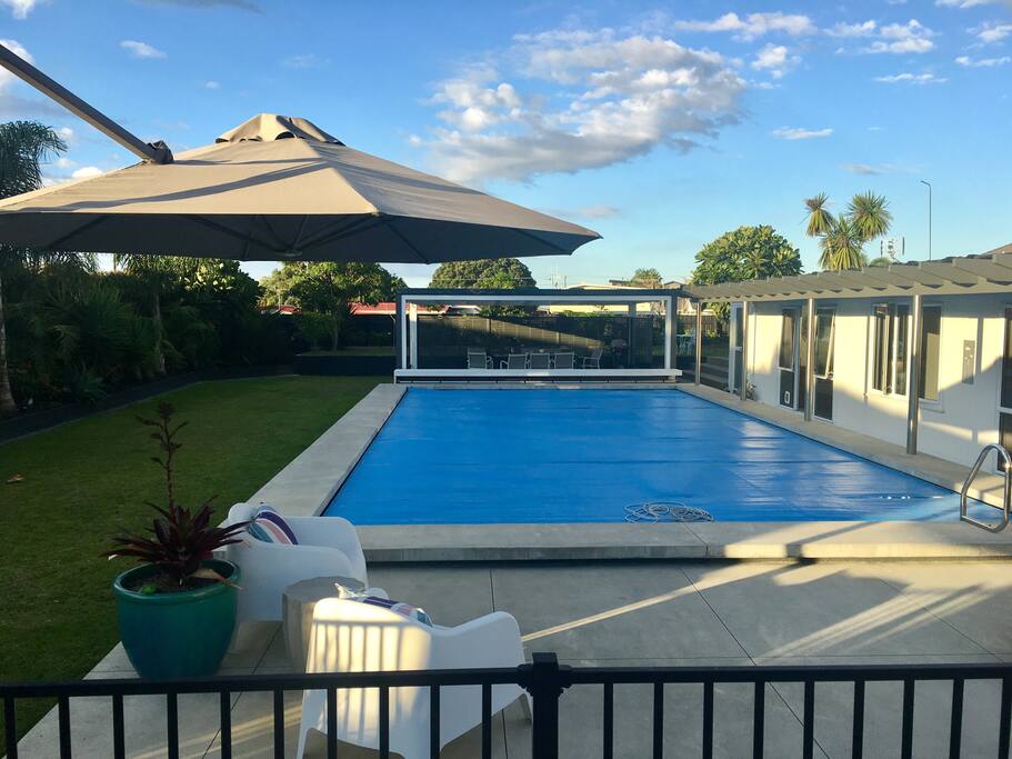 The pool and guesthouse to the right.