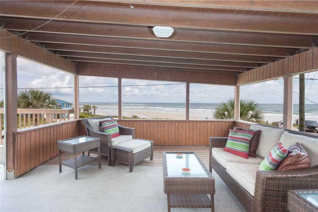 Covered Deck Area - The covered deck area is the perfect spot to enjoy spectacular sunrises with a cup of coffee in hand. Welcom