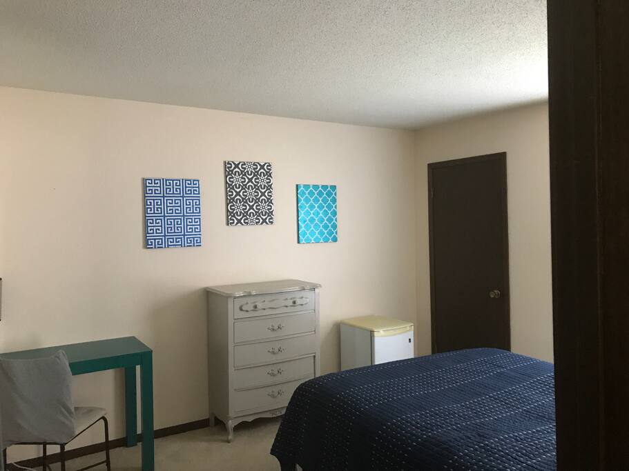 Room includes mini-fridge, dresser, desk, and 2 closets!