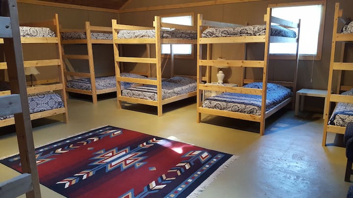 Main II dorm room with 6 twin bunks