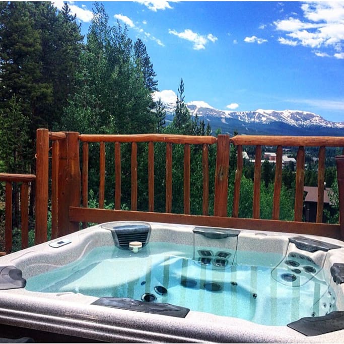 Shared hot tub on The Bivvi deck overlooking Breckenridge mountain.