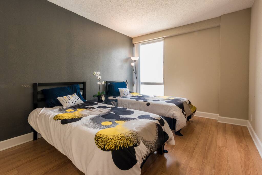 The second bedroom features two twin beds - ideal for a family trip or some friends who want to get together.