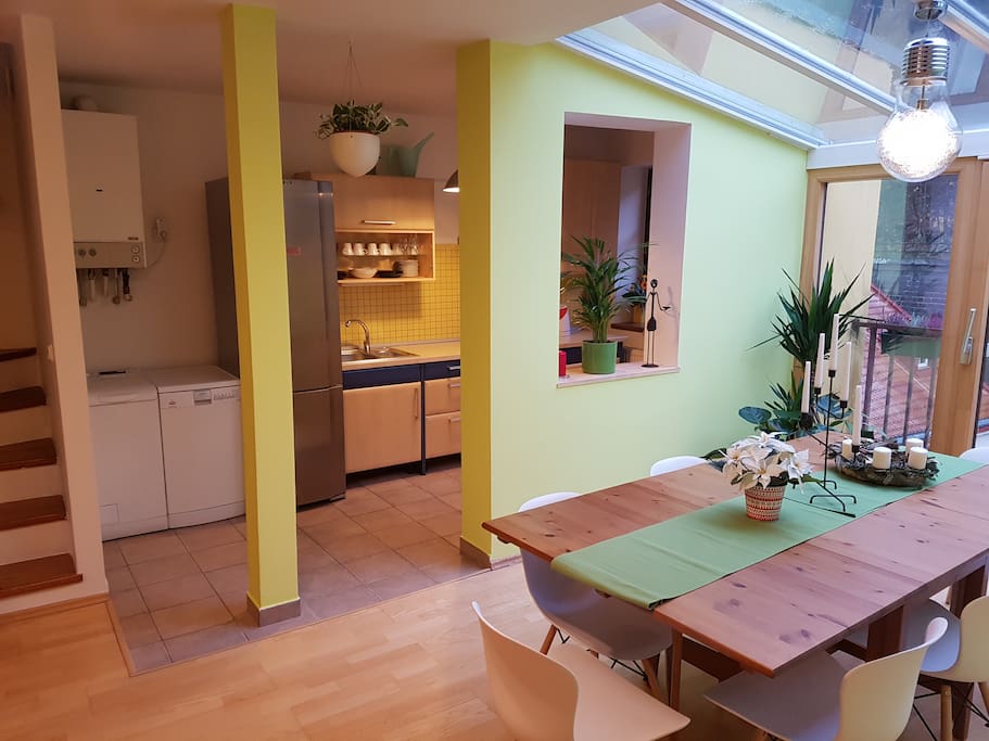 A view from the front door with a kitchen in the background
