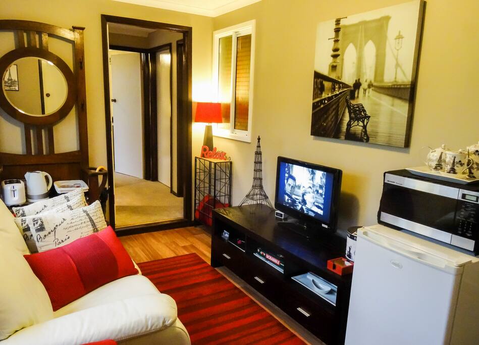 Relaxing Lounge Area with TV, DVD Player and a selection of DVD for your viewing