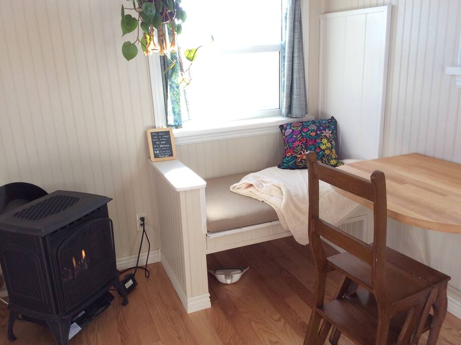 The tiny house is heated with a propane stove.