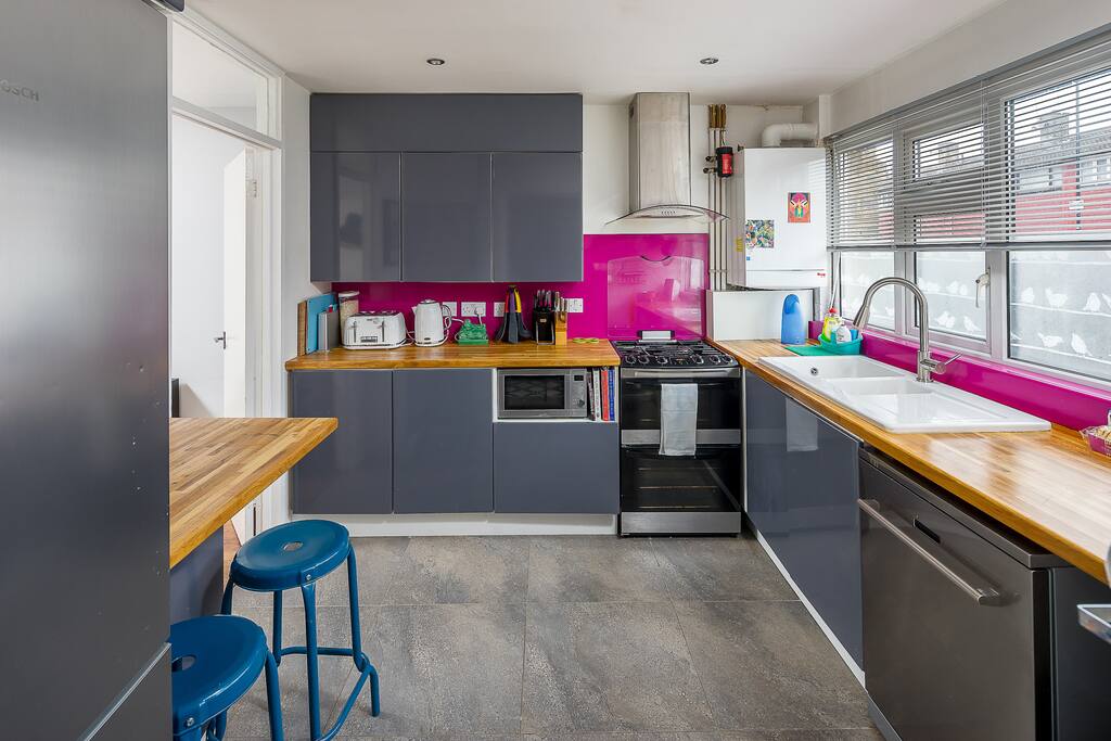 The kitchen is spacious and modern, with all the appliances you need