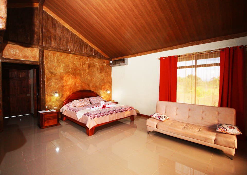 Comfortable king size bed and cozy sofa-bed along with a great A/C that cools the entire villa.