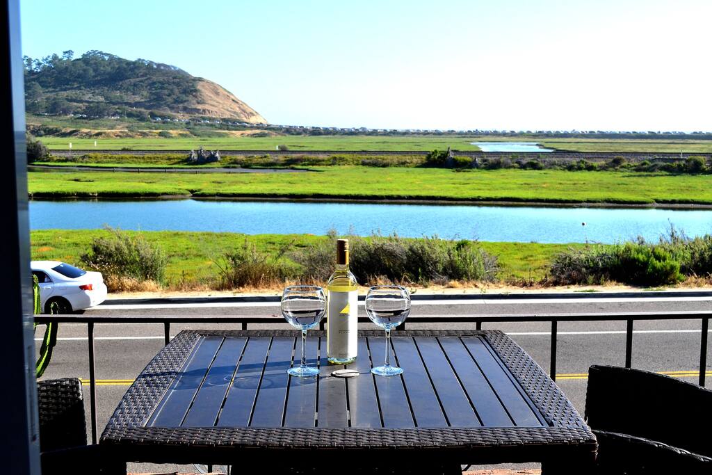 Enjoy the views and a glass of wine from the porch