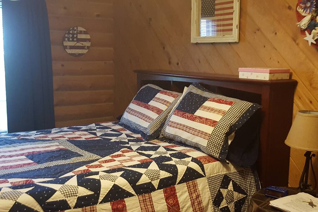 Second bedroom with full size bed, refrigerator, TV with Netflix.
