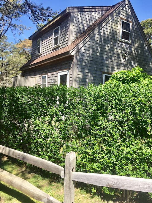 Walk to the beach, harbor, Long Pond, bike path and private tennis courts from this charming, nautical cottage